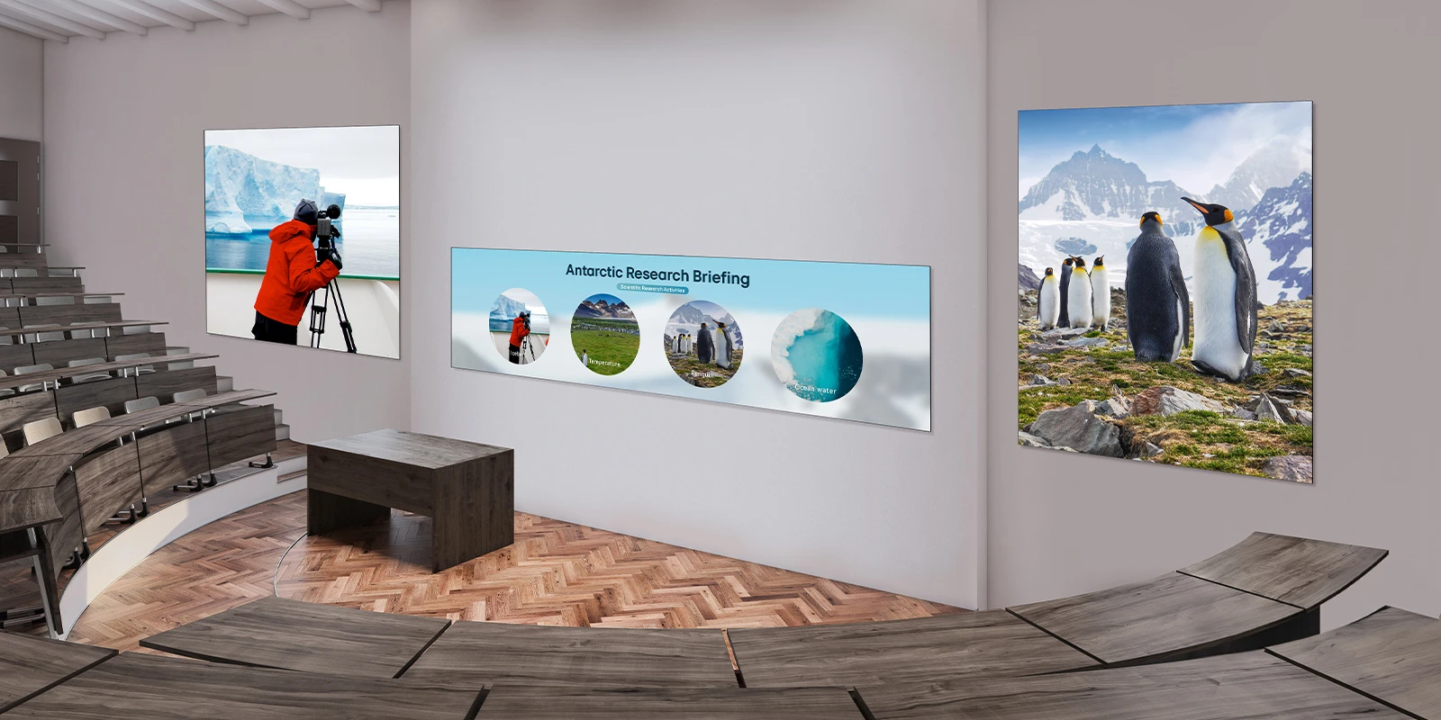 Three large LED displays are installed on an auditorium wall. A wide LASA136 display configured in a 1×2 layout is positioned in the center, with two displays configured in 2×1 layouts placed on either side, clearly showing briefing materials and natural scenery related to Antarctic ecology.